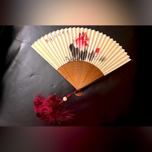 Beautiful Chinese Folding Fan designed with colorful delicate blossoms